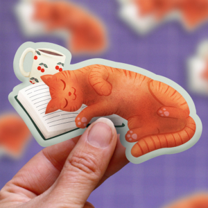Ginger cat with book | sticker